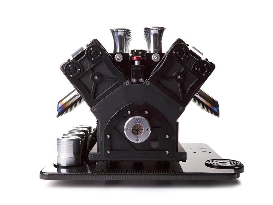SuperVeloce, V8, V10, V12, macchine espresso speciali, solo su ordinazione, ispirate ai motori della Formula 1, con dispenser di grappa italiana, realizzate in materiali pregiati, a mano, con finiture e soluzioni hi-tech tratte direttamente da quelle aerospaziali. In rosso, blu, arancio, metallo canna di fucile, oro e nero. Eroga un caffè personalizzato di eccezionale qualità. Prezzo a richiesta. Da vedere il sito, è unico: www.superveloce.co