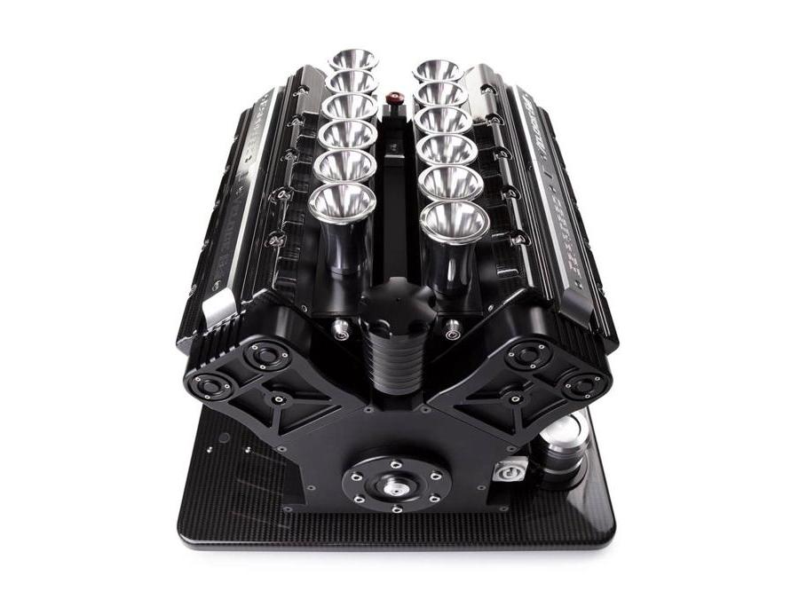 SuperVeloce, V8, V10, V12, macchine espresso speciali, solo su ordinazione, ispirate ai motori della Formula 1, con dispenser di grappa italiana, realizzate in materiali pregiati, a mano, con finiture e soluzioni hi-tech tratte direttamente da quelle aerospaziali. In rosso, blu, arancio, metallo canna di fucile, oro e nero. Eroga un caffè personalizzato di eccezionale qualità. Prezzo a richiesta. Da vedere il sito, è unico: www.superveloce.co
