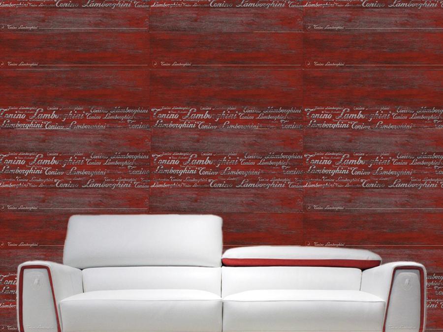 Tonino Lamborghini Tiles &Style. Divano Mars prodotto in collaborazione con Formitalia davanti alle piastrelle della collezione Montecarlo.