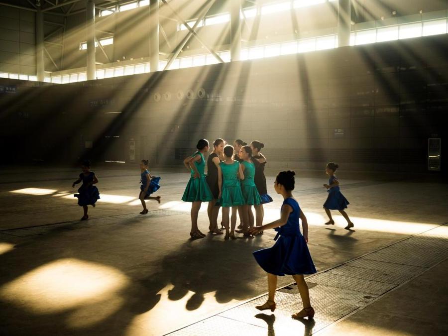 Image Name: Behind the scenes. Photographer Name: Zhou Xiaoqin. Year: 2018. Copyright: © Xiaoqin Zhou, China Mainland, Shortlist, Open Culture and 2nd Place, China National Award, 2018 Sony World Photography Awards