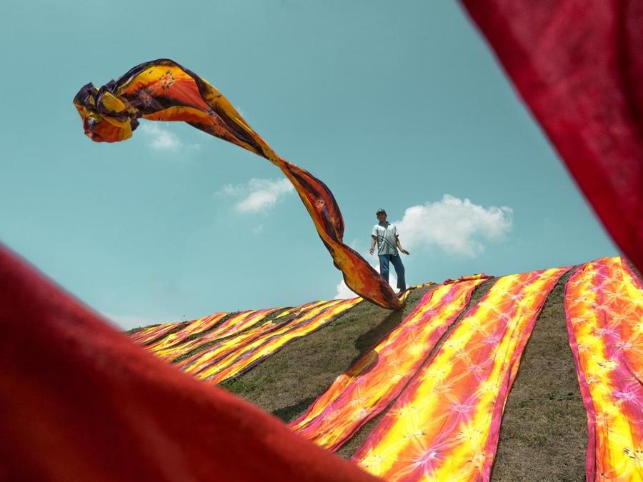 Image Name: The Drying Angel. Photographer Name: Ares Jonekson Saragi. Year: 2018. Copyright: © Ares Jonekson Saragi, Indonesia, Commended, Open Motion and 2nd Place, Indonesia National Award, 2018 Sony World Photography Awards