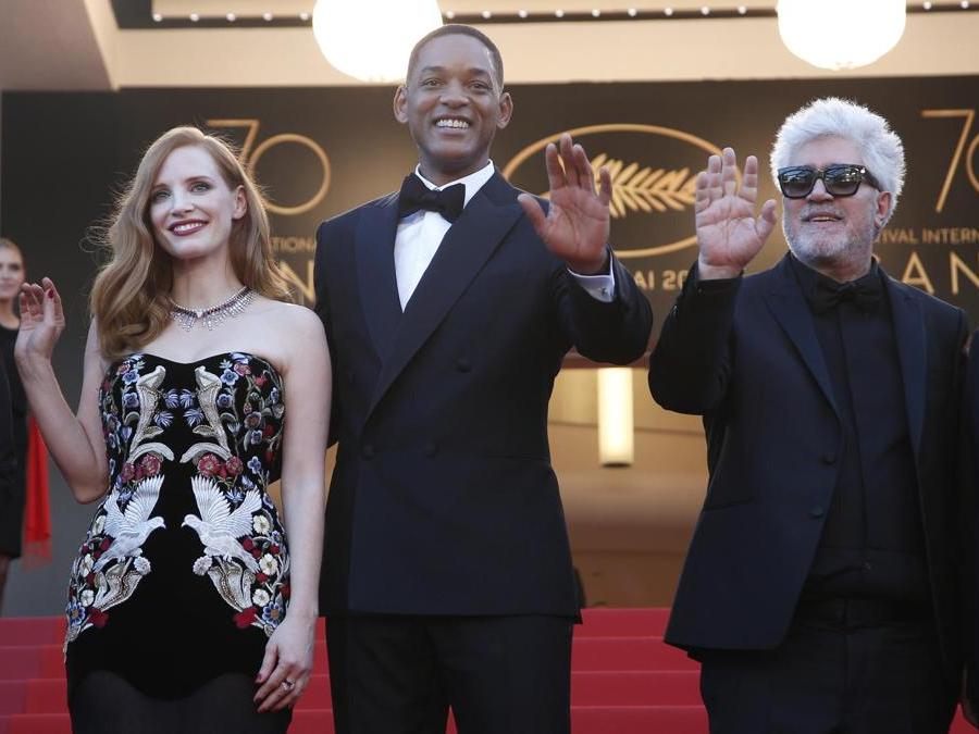 Jessica Chastain,  Will Smith e Pedro Almodovar. (AP Photo/Thibault Camus)