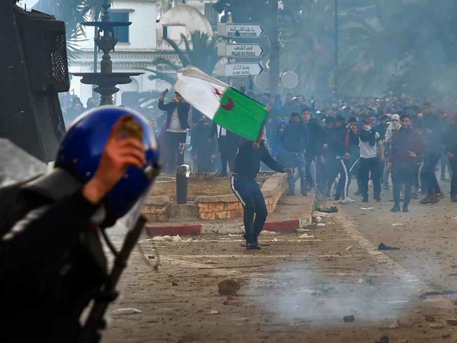 (Photo by RYAD KRAMDI / AFP)