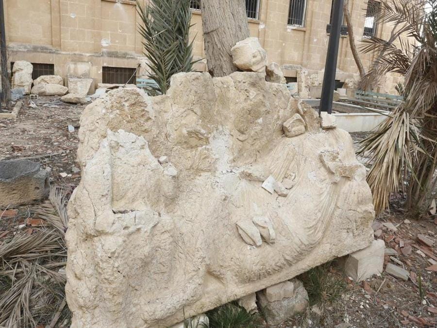 Un muro distrutto nella città storica di Palmyra. (EPA)