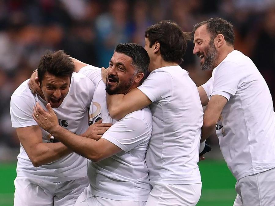 Massimo Oddo e Gennaro Gattuso  (AFP PHOTO / MARCO BERTORELLO)