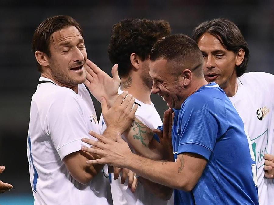 Francesco Totti e Antonio Cassano (AFP PHOTO / MARCO BERTORELLO)
