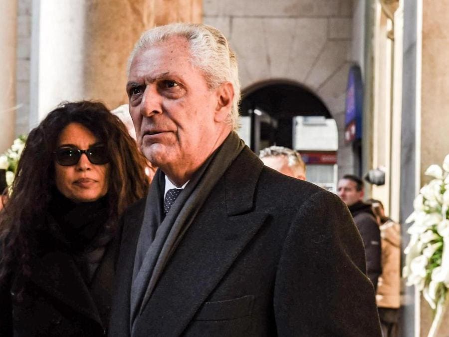 Marco Tronchetti Provera con Afef Jnifen ai funerali di Gian Marco Moratti,  scomparso a 81 anni, nella chiesa di San Carlo, Milano, 27 febbraio 2018. (ANSA/ Stringer)