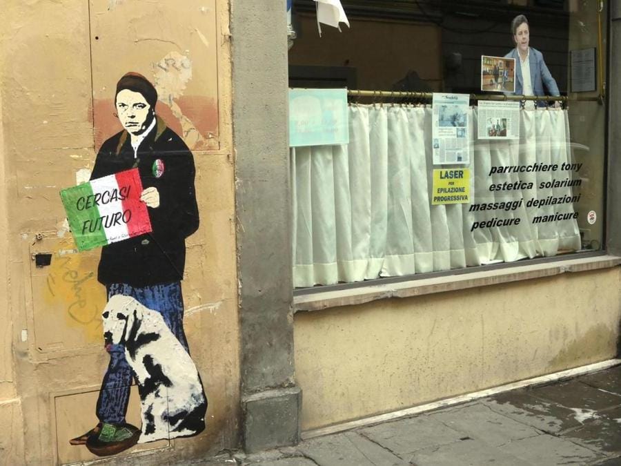 Lo street artist Tv Boy ha creato  in via Sant'Agostino  a Firenze uno sticker di Matteo Renzi. ANSA/CLAUDIO GIOVANNINI