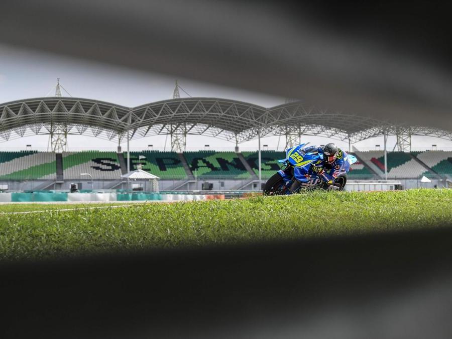 Andrea Iannone, Suzuki Ecstar / AFP PHOTO / Mohd RASFAN