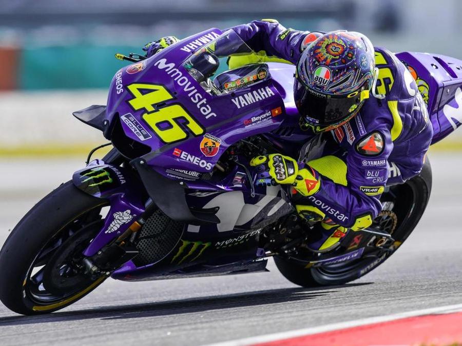 Valentino Rossi, Movistar Yamaha  / AFP PHOTO / Mohd RASFAN