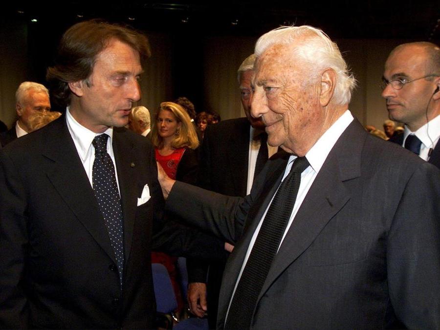 L'avvocato Gianni Agnelli con Luca Di Montezemolo ripresi in occasione dei festeggiamenti dei 100 anni della FIAT (ANSA/DAL ZENNARO)