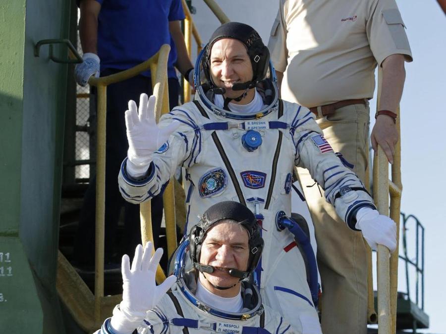  Randy Bresnik,  Paolo Nespoli e  Sergey Ryazanskiy (Epa/Dmitri Lovetsky)