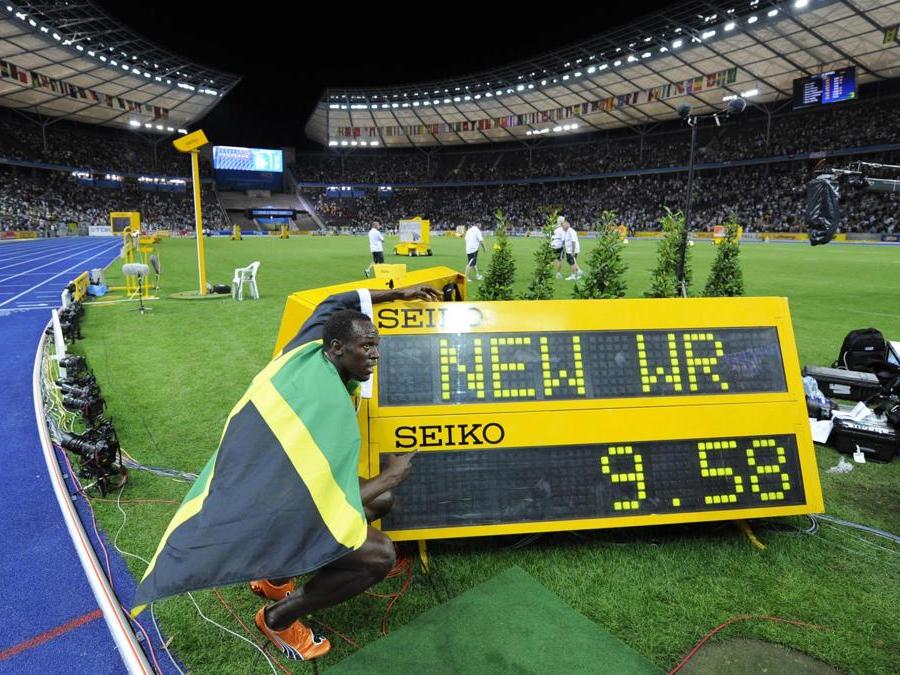 2009. Medaglia d'oro e record del mondo con il tempo di 9”58 nei 100 metri, ai mondiali di Berlino. (AFP) 