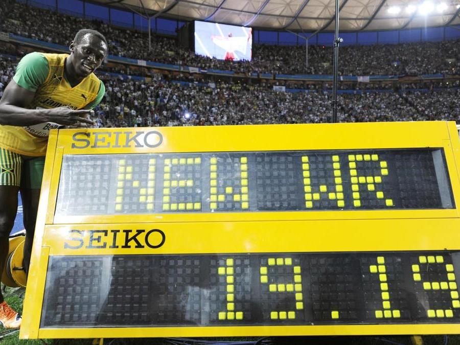 Oro e record del mondo con il tempo di 19”19 nei 200 metri, ai mondiali di Berlino. (AFP)