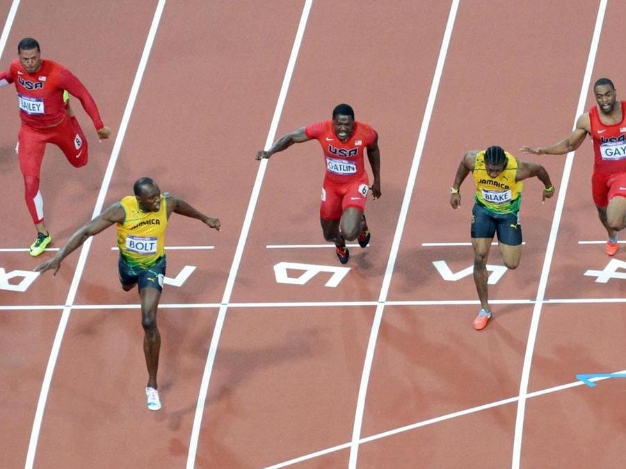 2012. Medaglia d'oro e nuovo record olimpico, con il tempo di 9”63, nei 100 metri alle Olimpiadi di Londra. (AFP)
