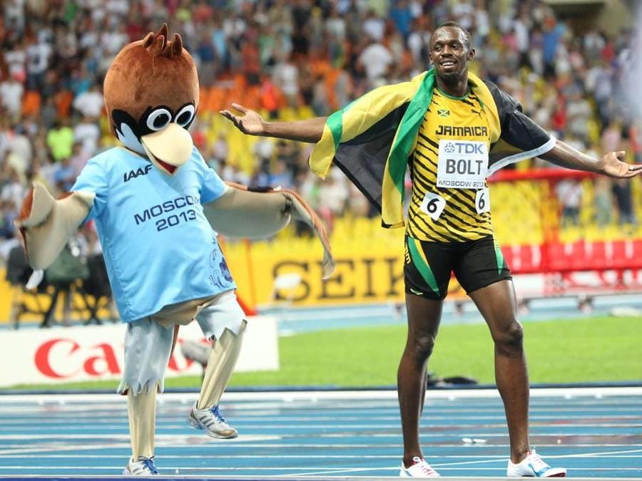2013. Con la mascotte dei mondiali di atletica di Mosca, al termine della gara dei 100 metri. (AFP)