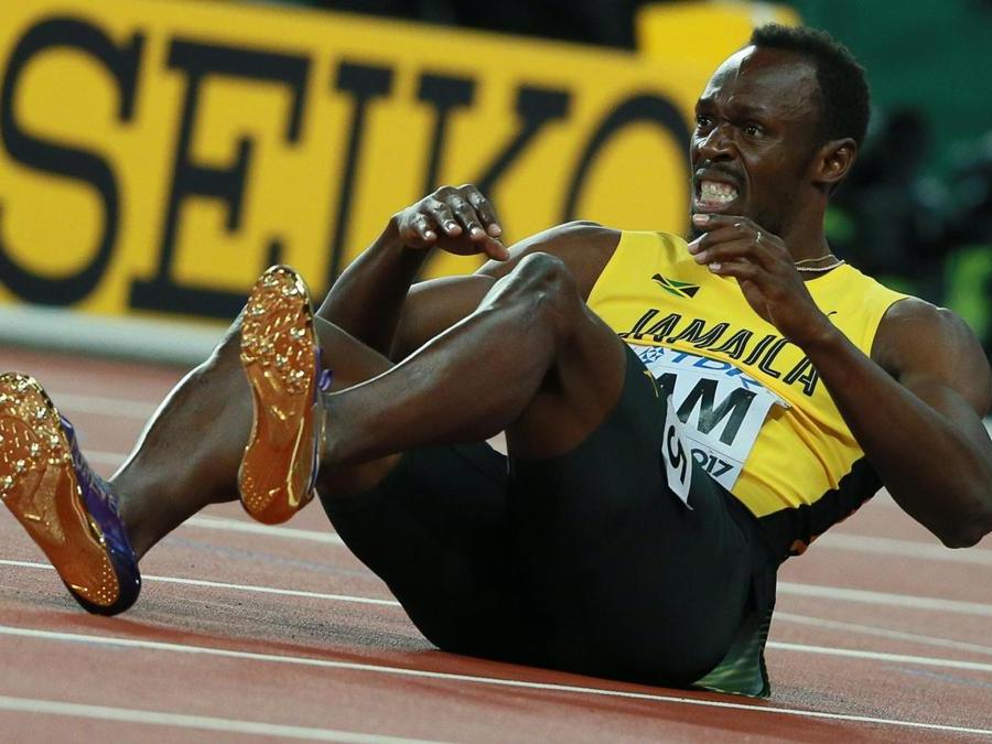 2017. La carriera della leggenda giamaicana, ai mondiali di Londra, si conclude con un ritiro per un problema muscolare, nell' ultima frazione della staffetta 4x100. (AFP)