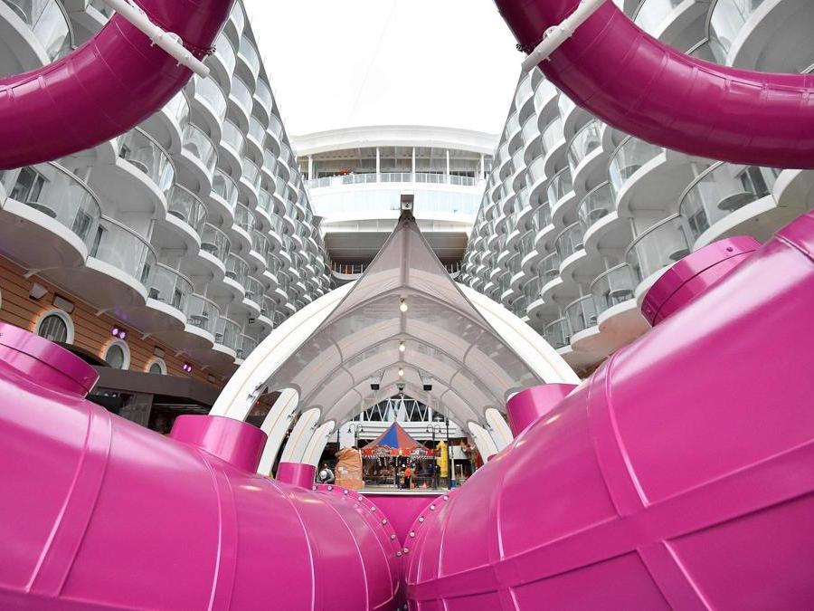 Partial view of the dual slide of the US company Royal Caribbean Cruise Limited (RCCL) tourism cruise liner Symphony of the Seas, taken at the shipyard of Saint-Nazaire, western France, on March 23, 2018, the day before it leaves the STX shipyards. / AFP PHOTO / LOIC VENANCE