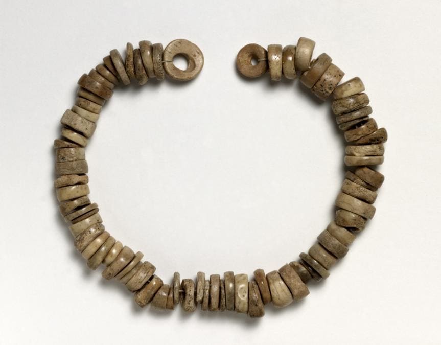Bone-bead necklace, part of the finds from Skara Brae, c. 3100–2500 BC Skara Brae, Orkney, Scotland. The Trustees of the British Museum