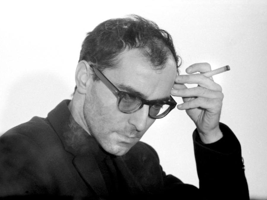 1965,  Jean Luc Godard.  (Photo by Georges Pierre / Collection ChristopheL via AFP)