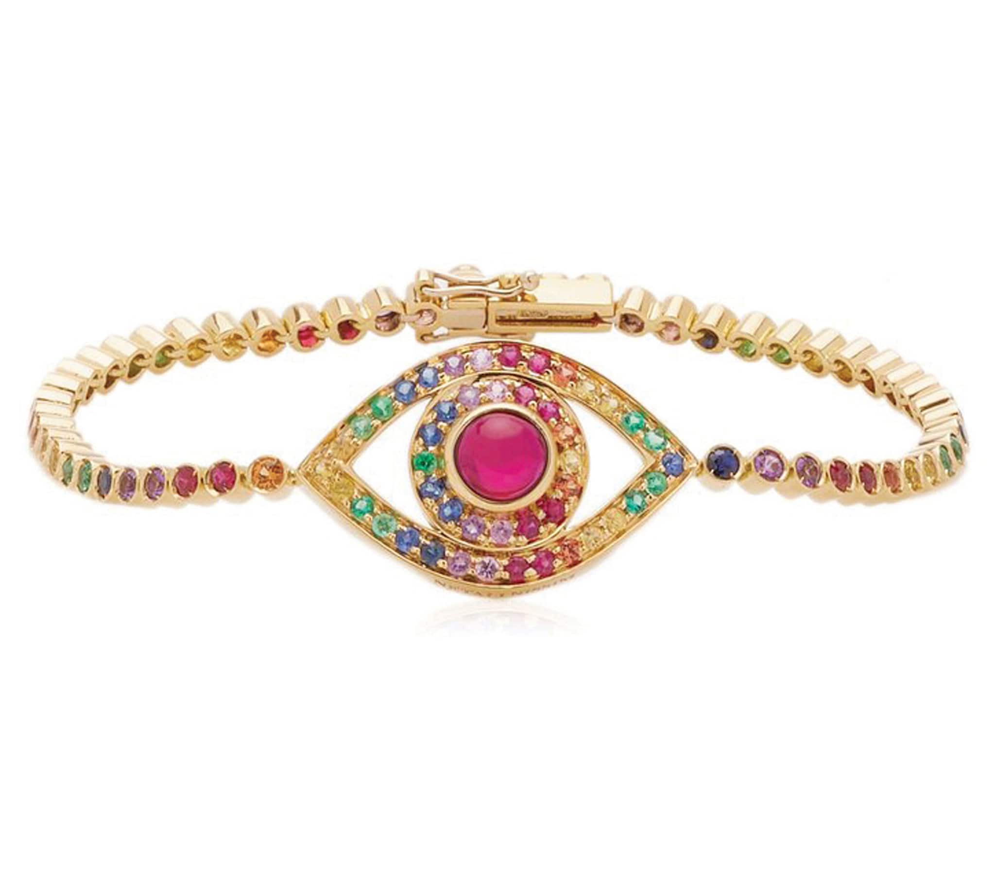 Netali Nissim. Bracciale Eye, interpretazione glamour di un antico simbolo di protezione, in oro giallo con rubino cabochon e pietre multicolor.