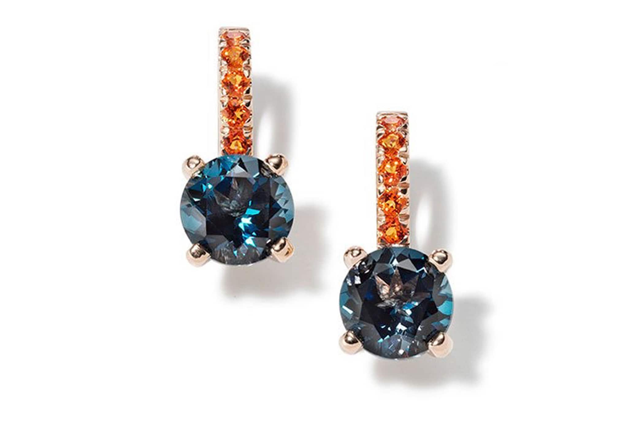 Fasoli. In oro rosa contopazio blue London e topazi orange.