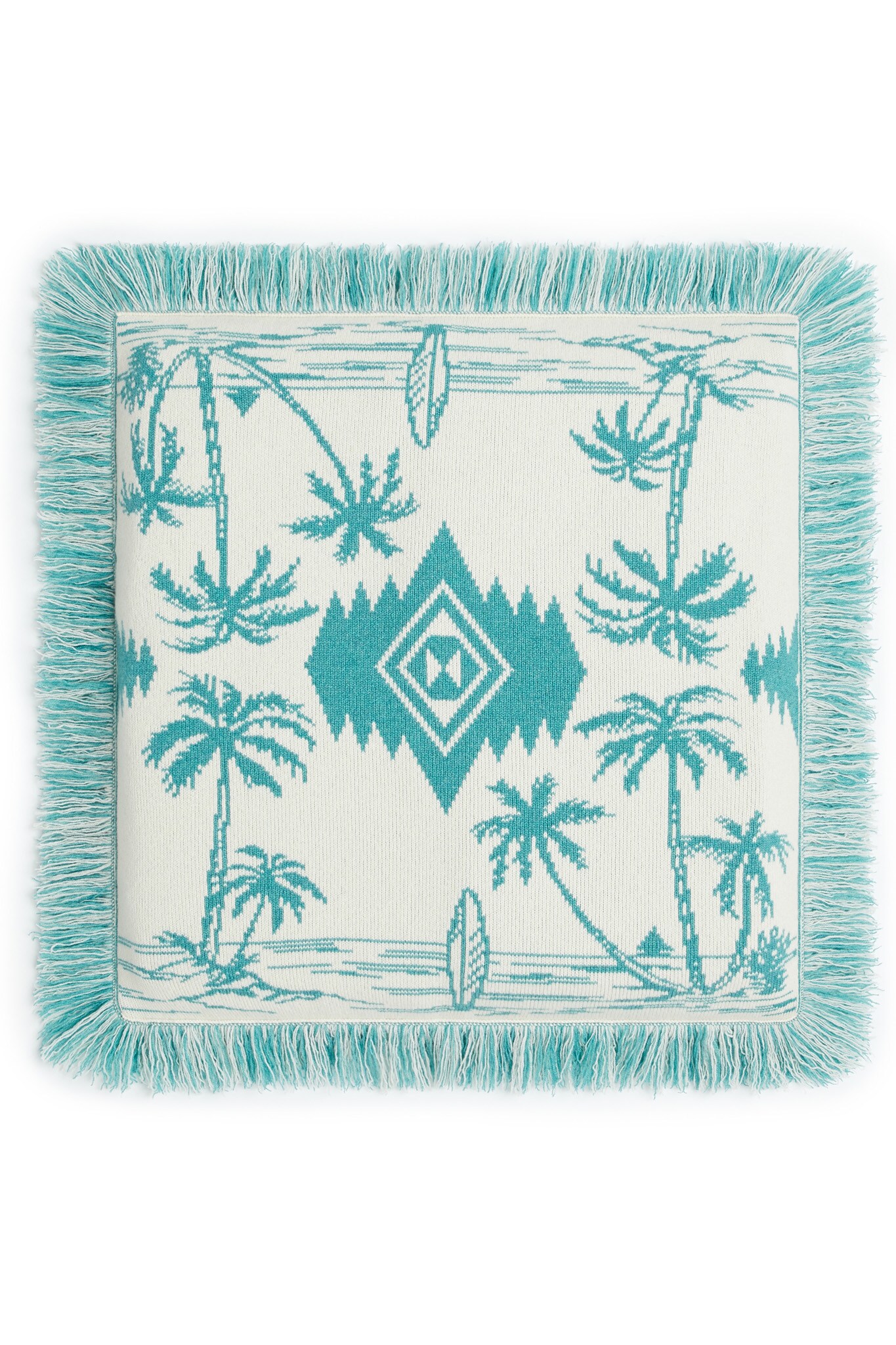 Cuscino in lana con disegno jacquard e frange, ALANUI HOMEWARE (640 €).