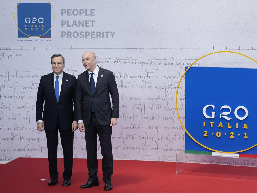 Il Ministro russo delle Finanze Anton Siluanov Mario Draghi  (AP Photo/Domenico Stinellis)