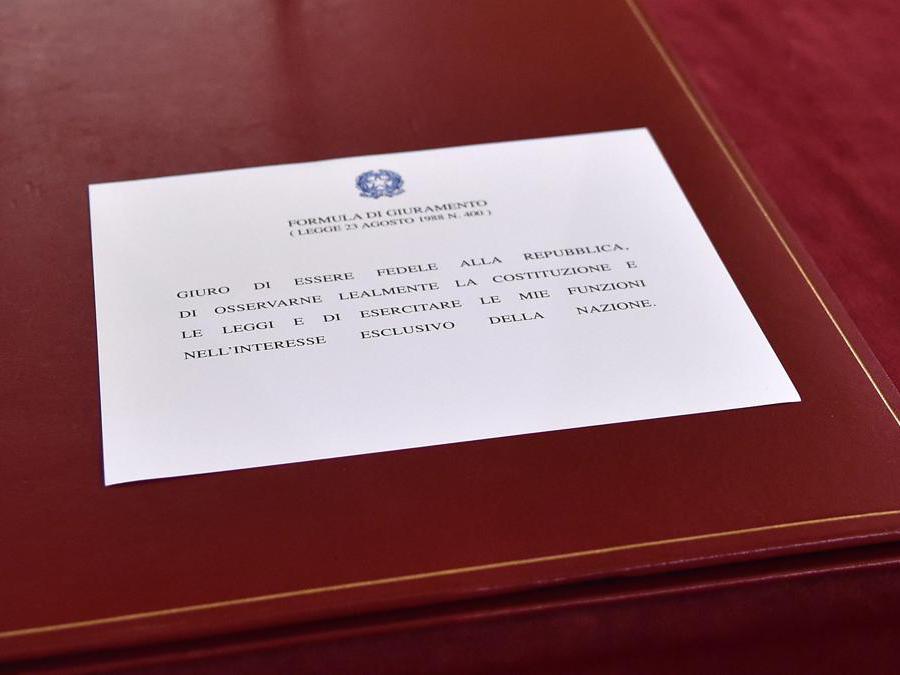 Il giuramento. (Photo by Andreas SOLARO / AFP)