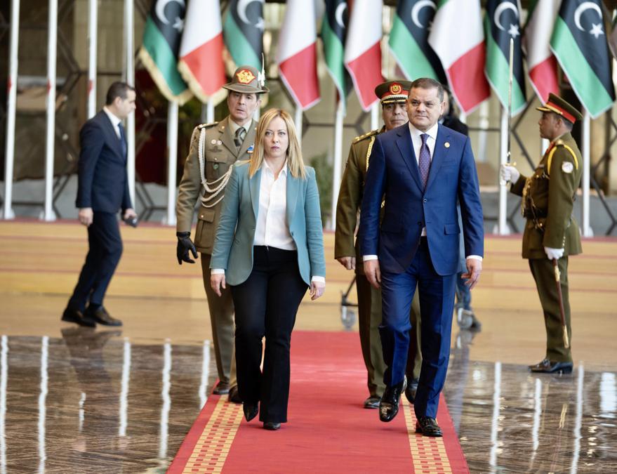 epa10435878 A handout photo made available by the Italian Government Press Office shows Prime Minister of the Libyan Government of National Unity Abdul Hamid Dbeibah (R) receiving Italian Prime Minister Giiorgia Meloni (L) during her visit in Tripoli, Libya, 28 January 2023. Giorgia Meloni landed in Tripoli accompanied by the Ministers of Foreign Affairs, Antonio Tajani, and of the Interior, Matteo Piantedosi, for a mission by the Italian Government to the North African country. EPA/FILIPPO ATTILI / HANDOUT HANDOUT EDITORIAL USE ONLY/NO SALES