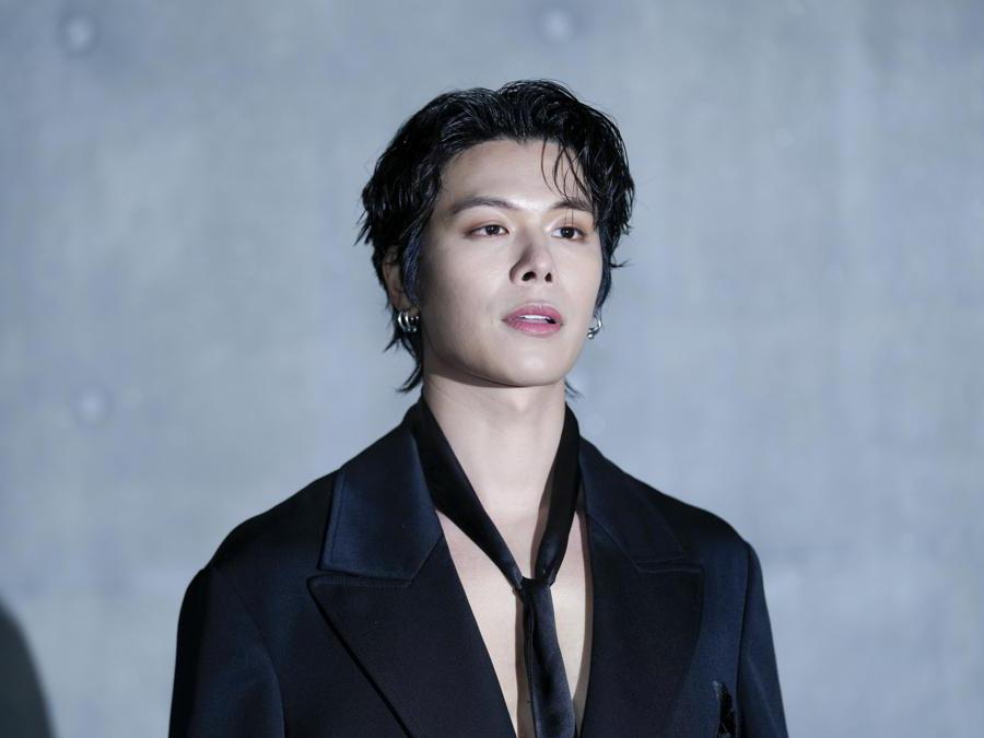 Glenn Yong attends the men's Giorgio Armani Fall-Winter 2024-2025 collection, that was presented in Milan, Italy, Saturday, Jan. 13, 2024. (AP Photo/Luca Bruno).