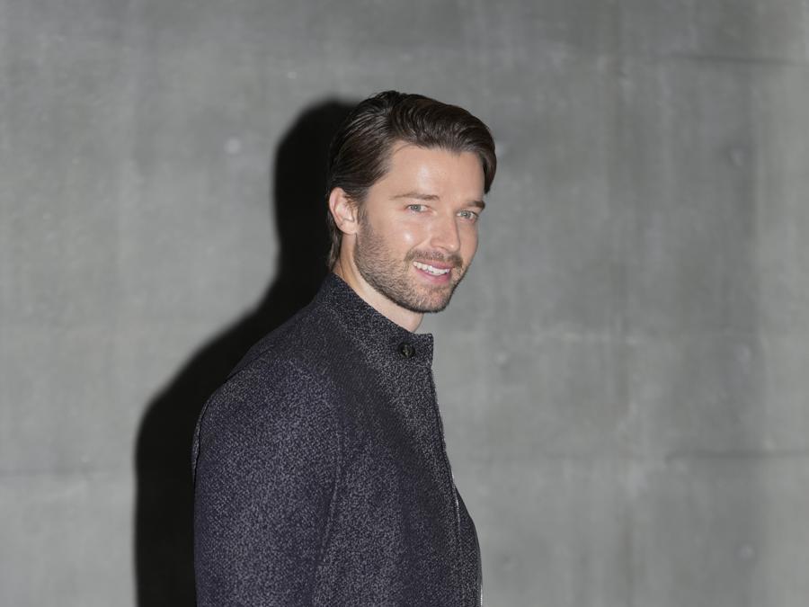 Patrick Schwarzenegger attends the men's Giorgio Armani Fall-Winter 2024-2025 collection, that was presented in Milan, Italy, Saturday, Jan. 13, 2024. (AP Photo/Luca Bruno).