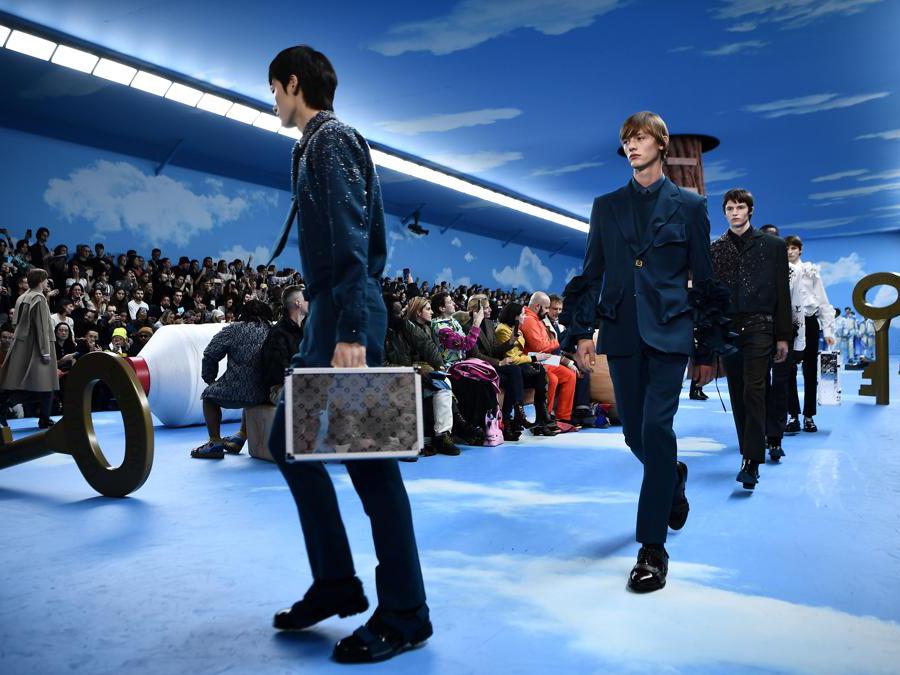 Models present creations by Louis Vuitton during the men's Fall/Winter 2020/2021 collection fashion show in Paris on January 16, 2020. (Photo by Anne-Christine POUJOULAT / AFP)