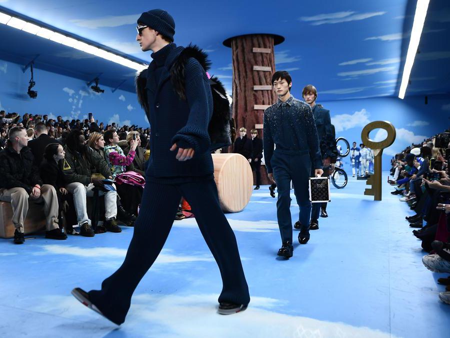Models present creations by Louis Vuitton during the men's Fall/Winter 2020/2021 collection fashion show in Paris on January 16, 2020. (Photo by Anne-Christine POUJOULAT / AFP)