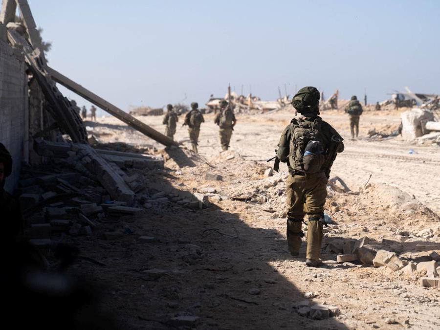 Israeli troops operate in the Gaza Strip, amid the ongoing ground operation of the Israeli army against the Palestinian Islamist group Hamas, in this handout image released November 19, 2023. Israel Defense Forces/Handout via REUTERS THIS IMAGE HAS BEEN SUPPLIED BY A THIRD PARTY