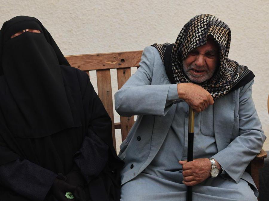 EDITORS NOTE: Graphic content / Relatives mourn the death of a woman and her child from the Palestinian Sheikh el-Eed family, killed along with another child from the household a day earlier, when their home was hit by Israeli bombardment on Rafah in the southern Gaza Strip, outside the morgue of the al-Najjar hospital, on November 19, 2023, as battles continue between Israel and the Palestinian militant group Hamas. (Photo by SAID KHATIB / AFP)