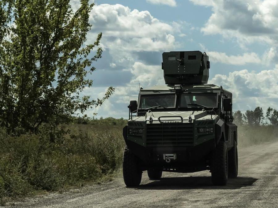 Ukrainian servicemen ride a military vehicle, amid Russia's attack on Ukraine, near the Russian border in Sumy region, Ukraine August 12, 2024. REUTERS/Viacheslav Ratynskyi
