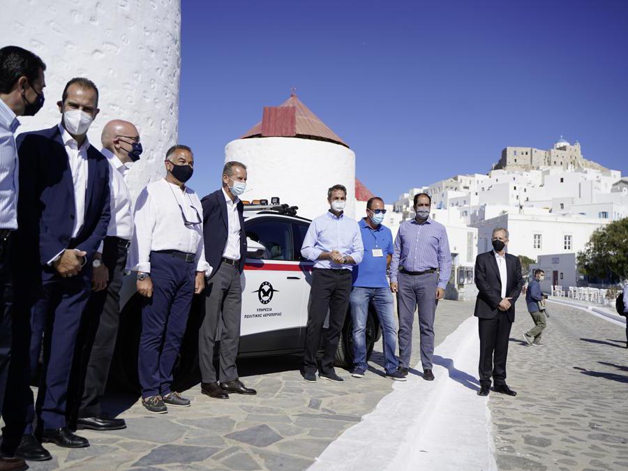 Volkswagen CEO Herbert Diess and Prime Minister Kyriakos Mitsotakis handover Greece' first electric police car in Astypalea.