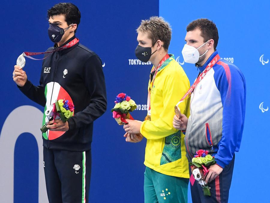 Nuoto, 100 metri farfalla S9. Da sinistra:  Simone Barlaam, medaglia d’argento, William Martin (Australia), medaglia d’oro e Alexander Skaliukh (Russia), medaglia di bronzo.  (Photo by Ilya Pitalev / Sputnik / Sputnik via AFP)