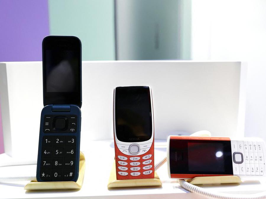  Nokia 2660 Flip, the Nokia 8210 4G, and the new Nokia 5710 XA. (Photo by Joan Cros / NurPhoto / NurPhoto via AFP)